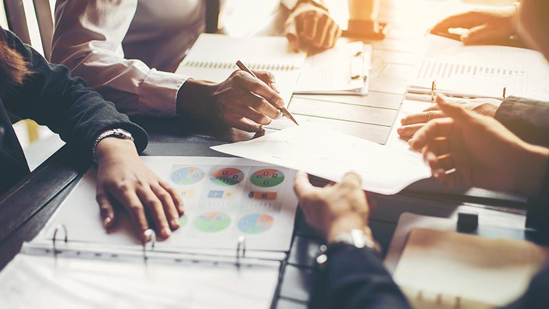 Business people working at table