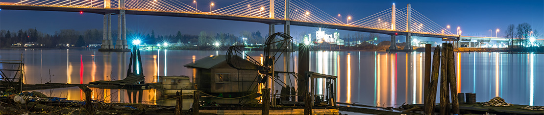 Bridge light up with streetlights at night.