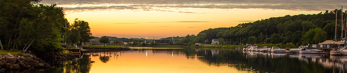 Yellow sunset reflecting off a body of water